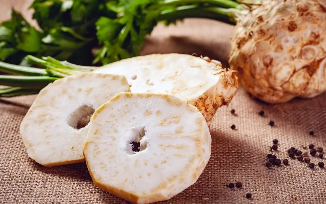 celeriac-chopped-on-a-fabric-surface.webp