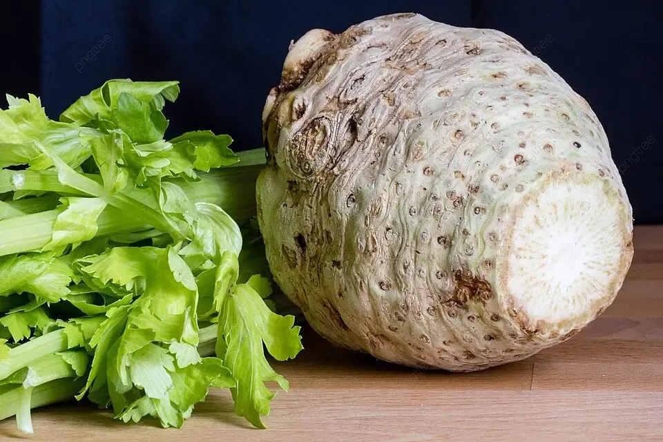 pngtree-fresh-celery-root-with-crunchy-celeriac-leaves-on-wooden-table-for-healthy-meal-photo-photo-image_69568000.webp